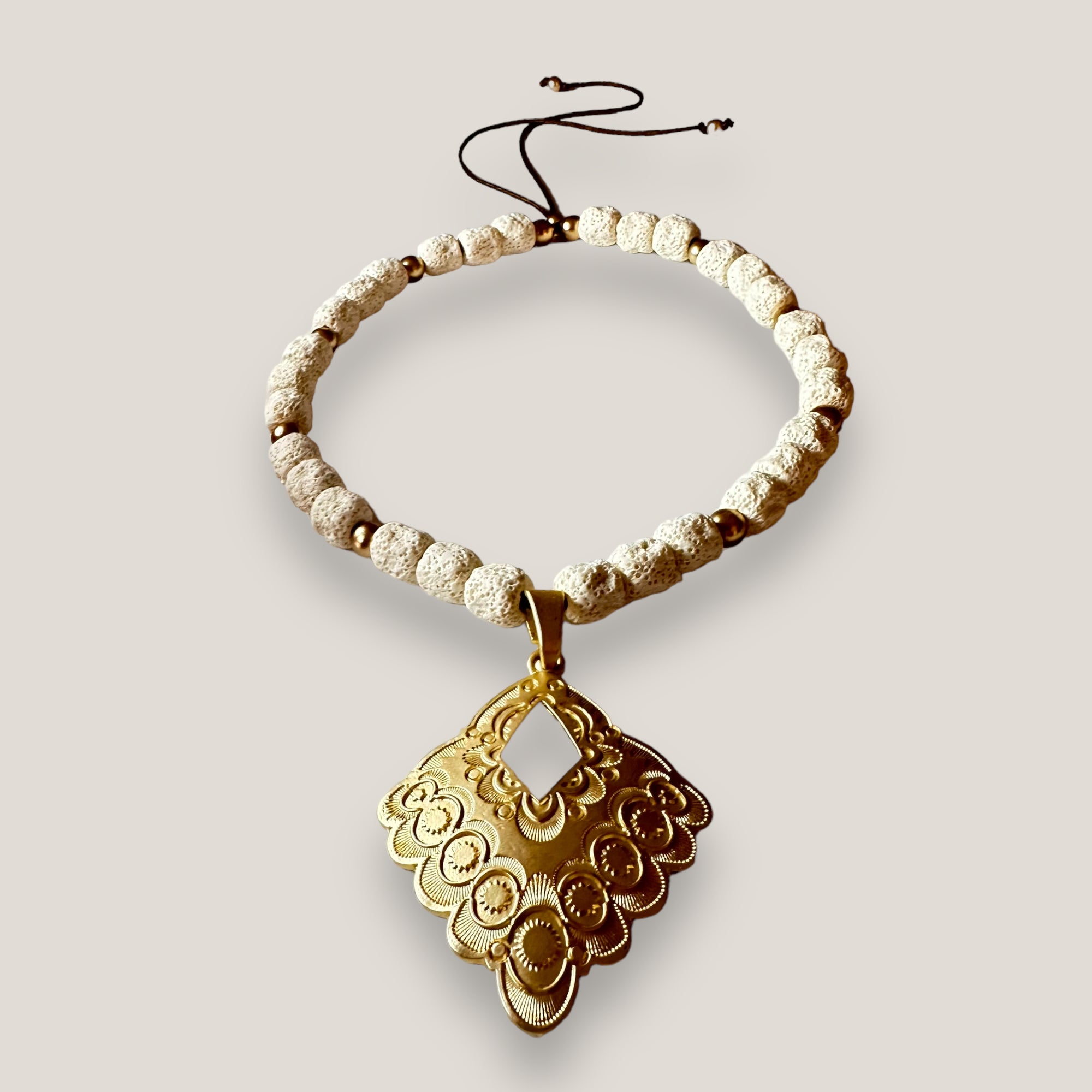Maxi bracelet with golden turtle and colored lava