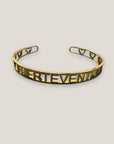 Brazalete Fuerteventura corazones acero titanio oro