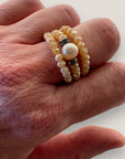 Trio de anillos con perla y cristales facetados melocotón con discos con circonitas