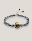 Bracelet with large golden turtle and colored lava