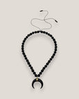 Collar luna cuerno lava negra separadores dorados cristal negro
