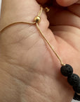 Bracelet with large golden turtle and colored lava