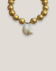 Collar gran caracola turbante nácar beis dorado cuentas madera pan de oro