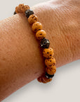 Pulsera Dafne con esponja coral calabaza y filigrana bronce con cristalitos