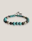 Pulsera Dafne perlas con lava turquesa y filigrana gunmetal con cristalitos