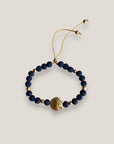 Pulsera con gran concha dorada y lava azul añil