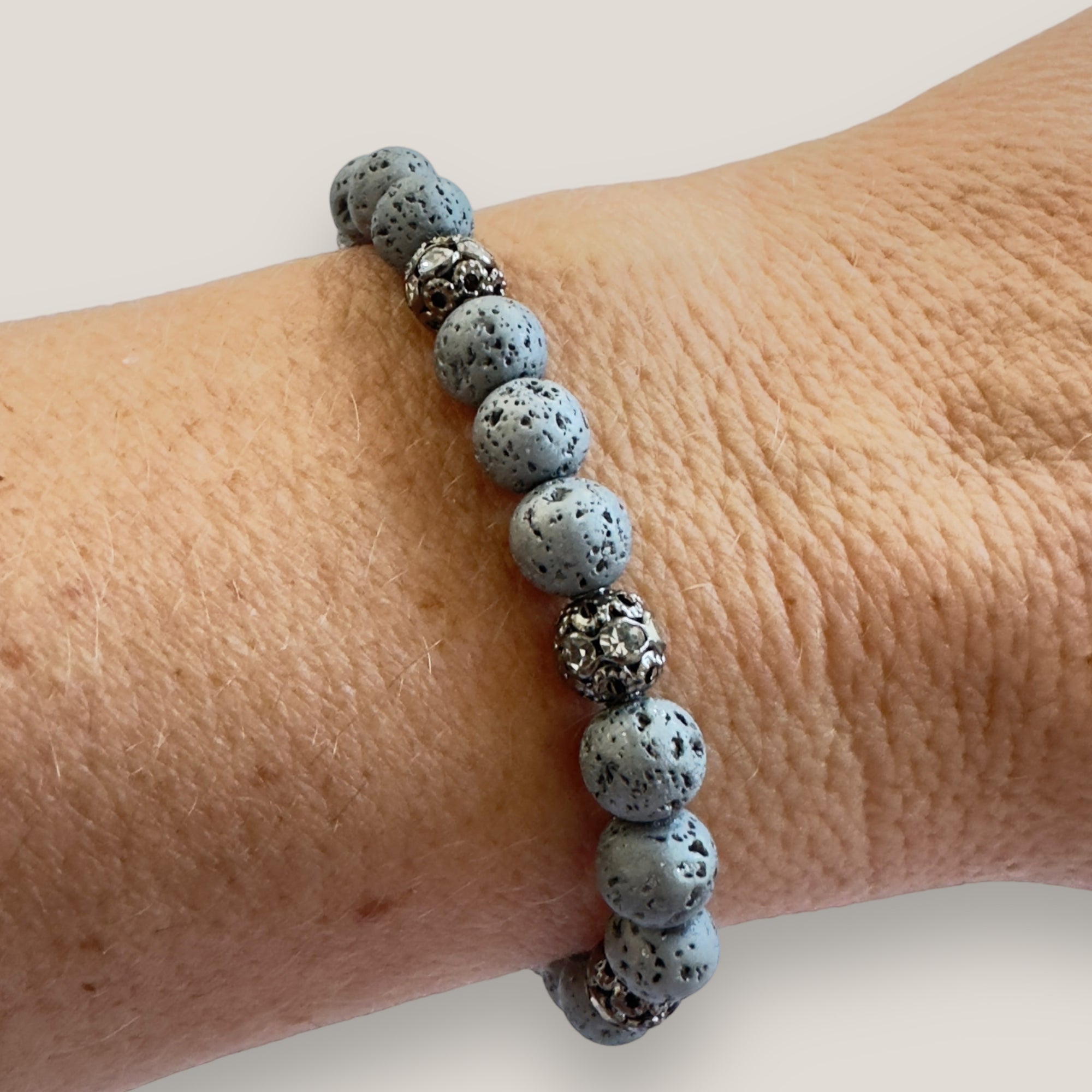 Bracelet with large golden turtle and colored lava