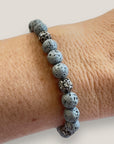 Bracelet with large golden turtle and colored lava