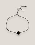 Pulsera minimal con bola 8mm de lava negra