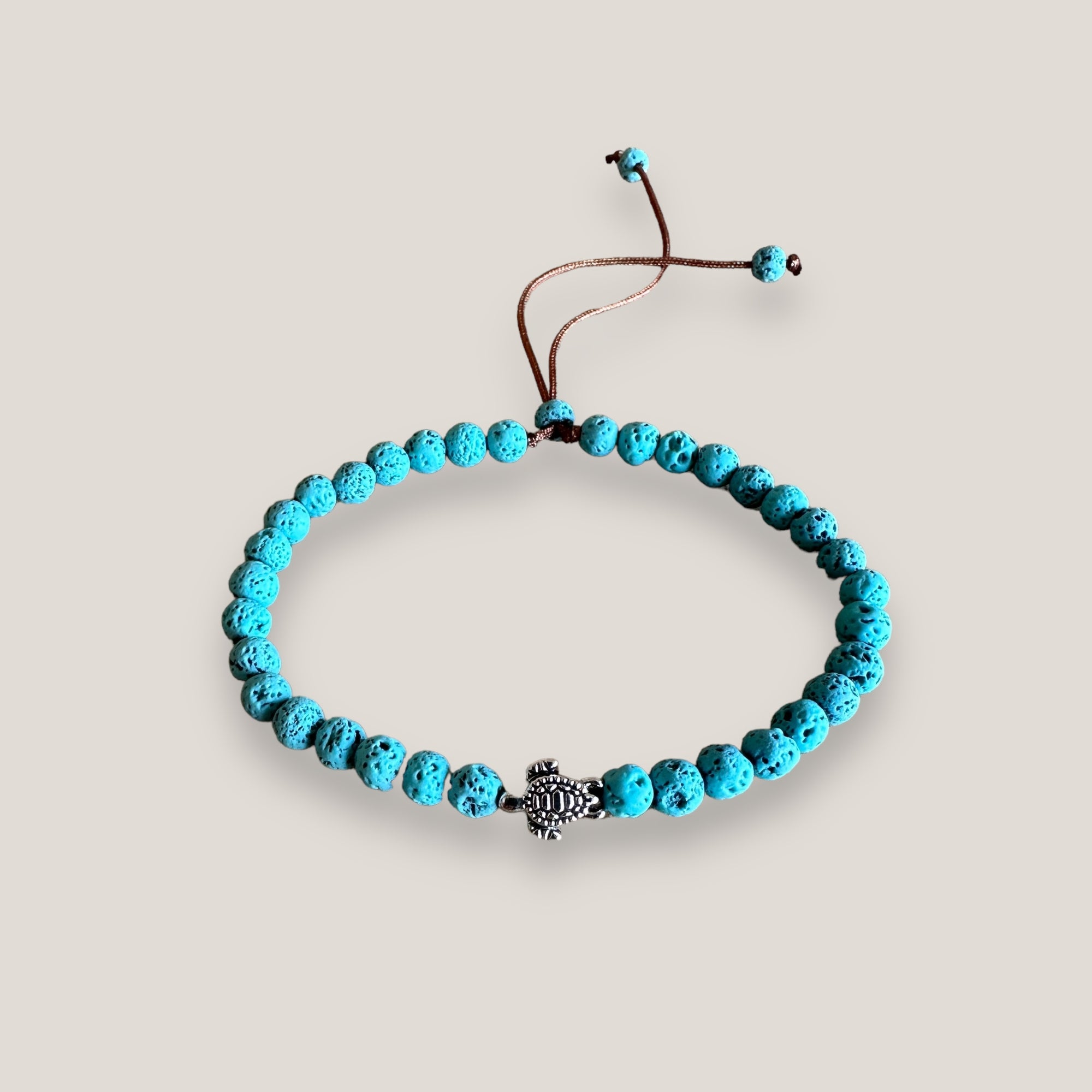 Maxi bracelet with silver turtle and lava color