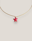 Collar minimal con estrella de howlita rosa fucsia