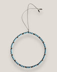 Collar Dafne con esponja coral azul cielo y filigranas gunmetal con cristalitos
