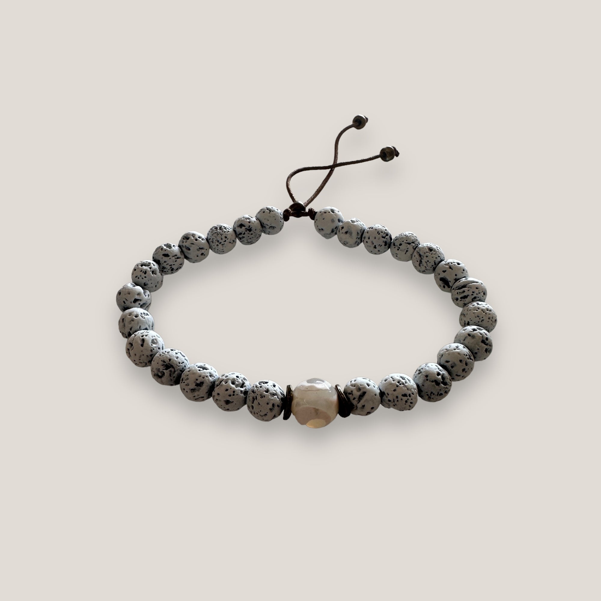 Pulsera ojo aborigen blanco y lava blanca