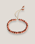 Pulsera medium base 6mm esponja coral rosa, rondeles dorados con cristalitos rosas