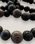 Pulsera base con gran ojo aborigen de la suerte y lava negra