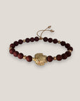 Bracelet with large golden turtle and colored lava