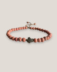 Pulsera con tortuguita plateada y lava rosa