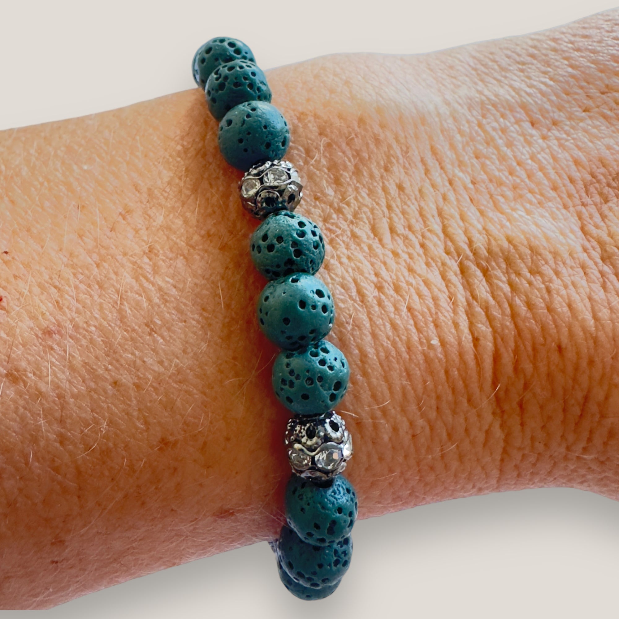 Bracelet with large golden turtle and colored lava