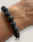 Pulsera con ojo de la suerte aborigen y lava gris oscuro