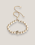 Pulsera círculos concentricos y y cuentas de piedra blanca