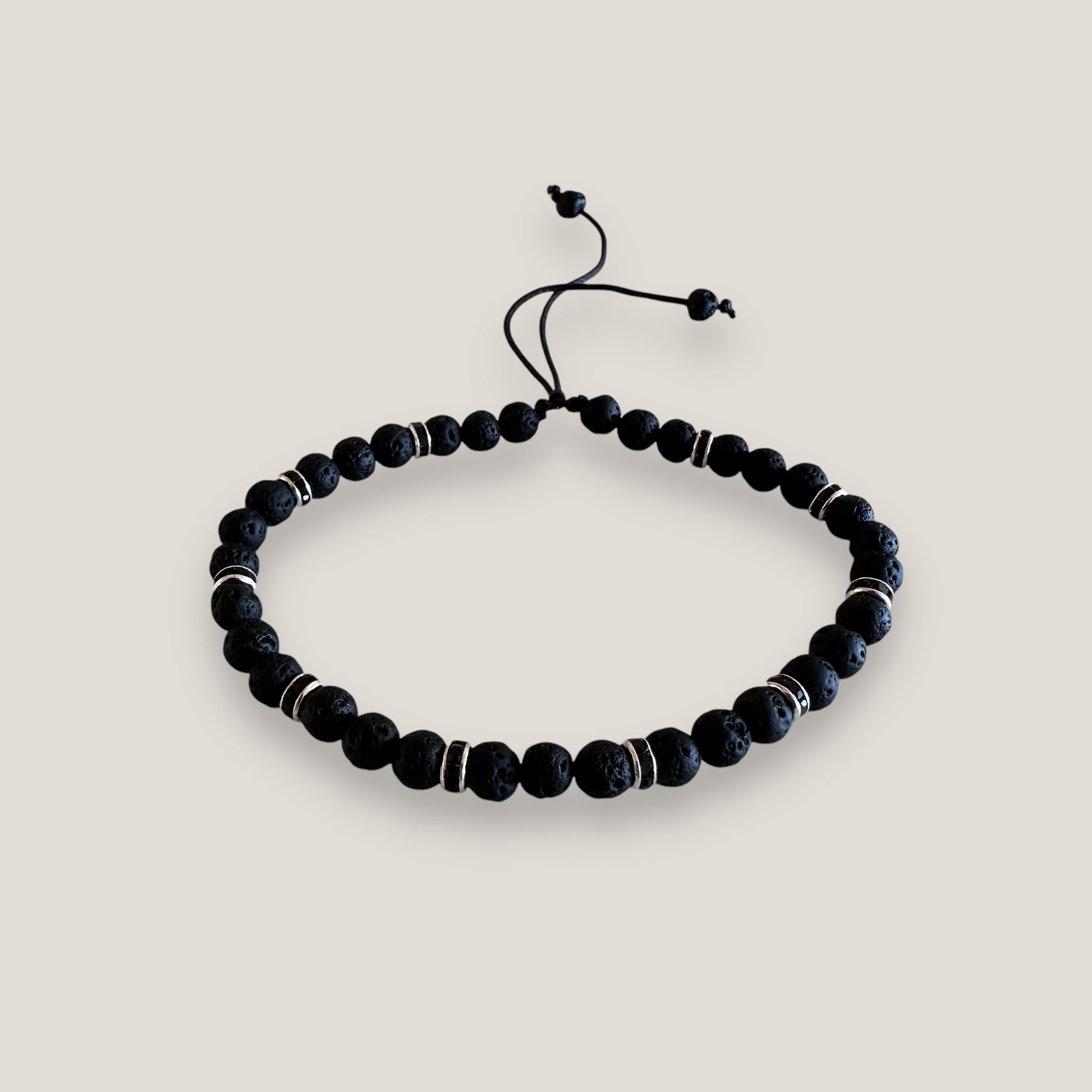 Armband mit schwarzen Lavaperlen und silbernem Glitzer mit schwarzen Kristallen
