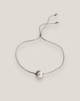 Pulsera minimal con bola 8mm de lava blanca