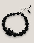 Pulsera tortuga resina negra lava negra cristales facetados negros