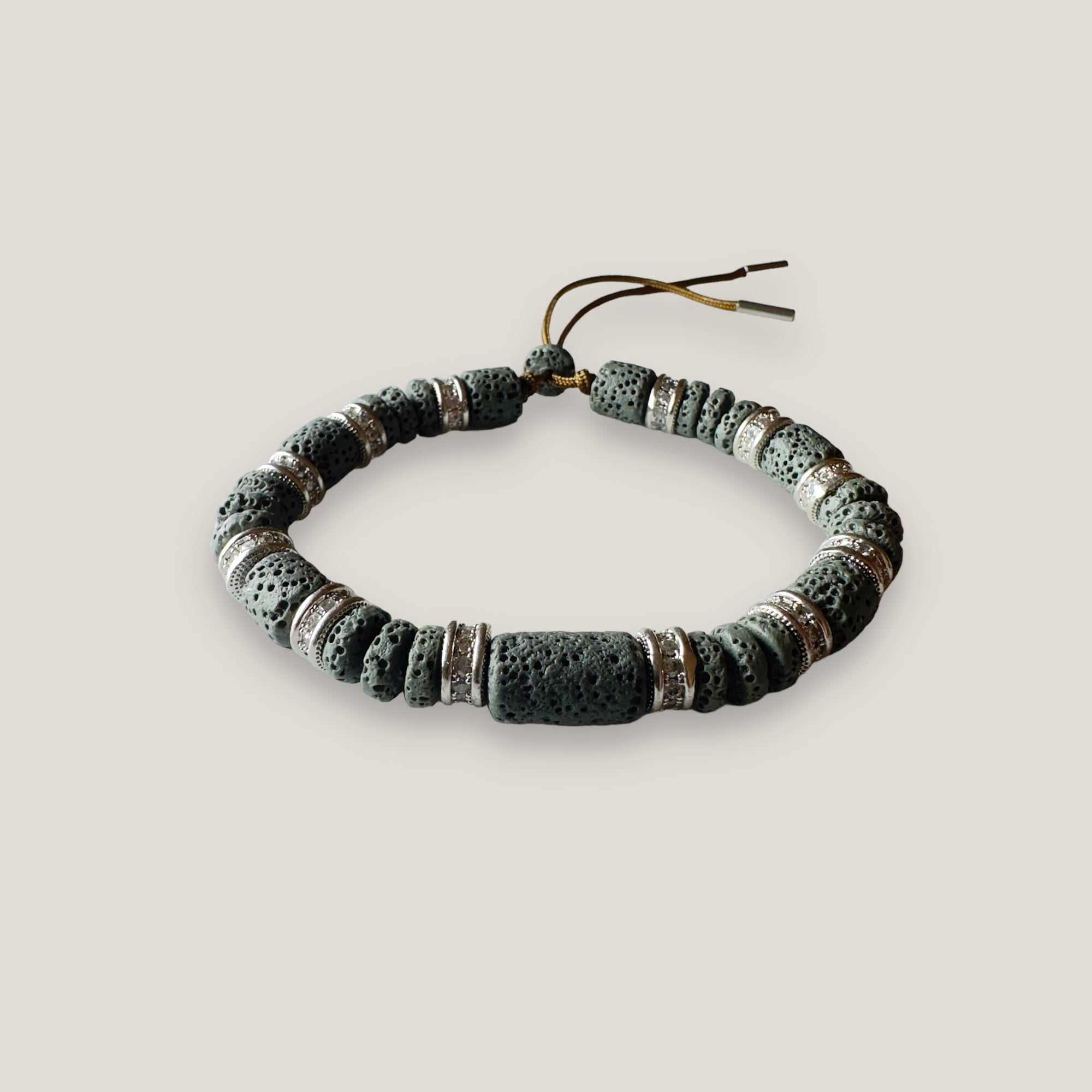 Pulsera Fuerte Beads tambor, discos, tambores de lava gris oscuro y rondeles plateados con circonitas