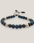 Pulsera Dafne perlas con esponja coral azul claro y filigrana gunmetal con cristalitos