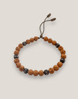 Pulsera Dafne con esponja coral calabaza y filigrana bronce con cristalitos