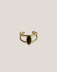 Länglicher, ovaler goldener Ring mit schwarzem Achat und Stahlgold.