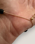 Bracelet with large golden turtle and colored lava