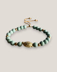 Pulsera con gran tortuga dorada y esponja coral verde turquesa