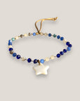 Pulsera cadena acero oro y medallita estrella nacar con cuentas de cristal azules
