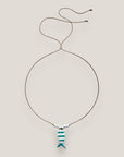 Collar midi pez esmaltado blanco con rayas verde turquesa y cuentas de lava blancas