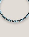 Collar Dafne con esponja coral azul cielo y filigranas gunmetal con cristalitos