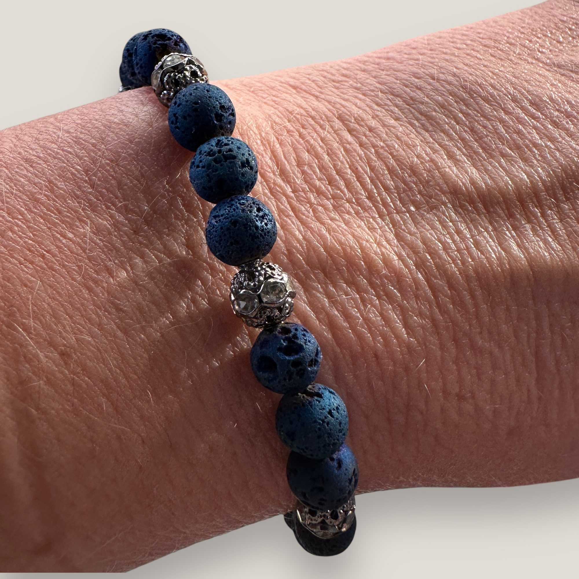 Bracelet with large golden turtle and colored lava