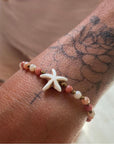Bracelet with silver turtle and purple lava