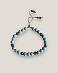 Pulsera Dafne con esponja coral azul cielo y filigrana gunmetal con cristalitos