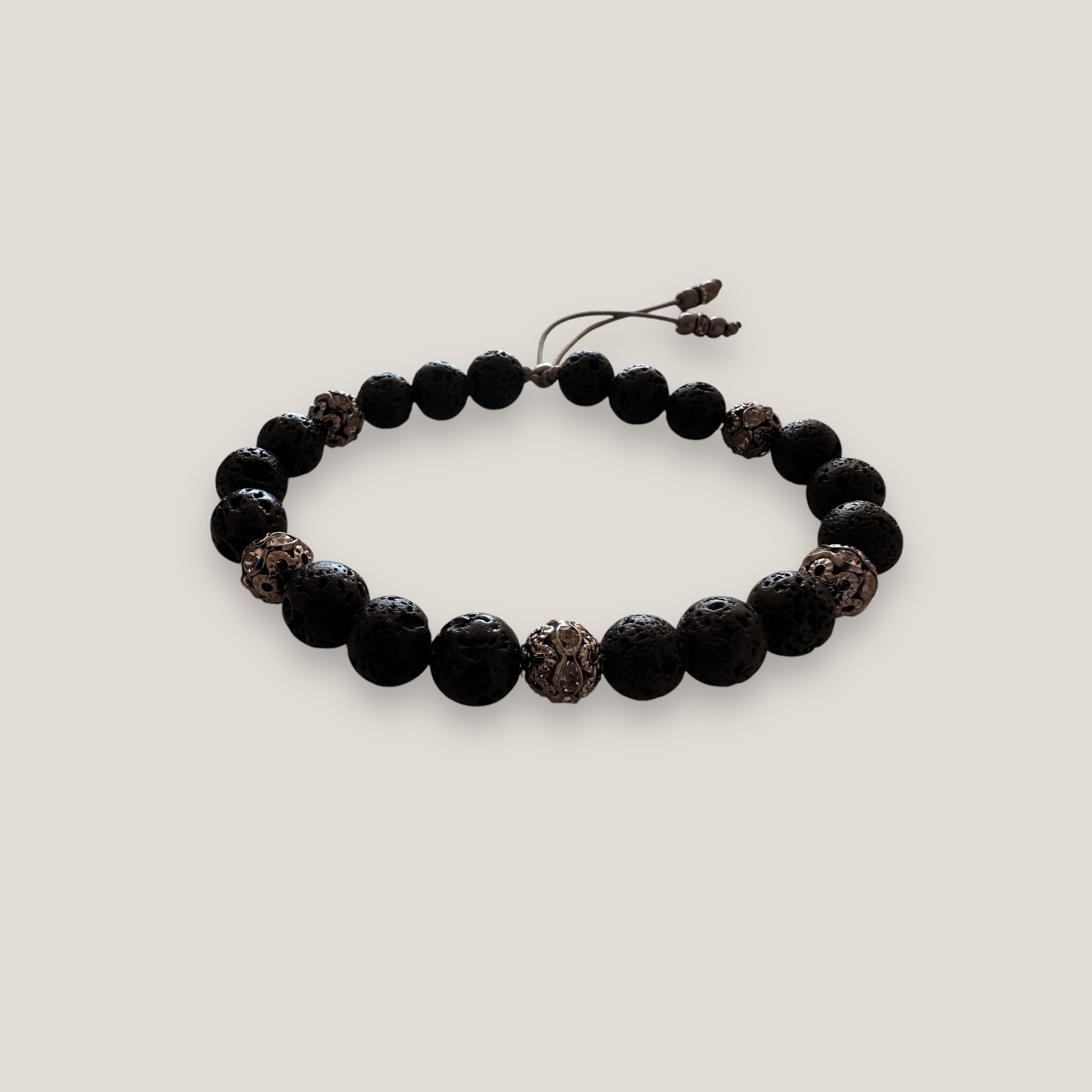 Pulsera Gran Dafne con lava negra y filigrana gunmetal con cristalitos