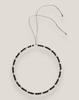 Collar mini Dafne perlas lava negra, rondeles gunmetal con cristalitos blancos