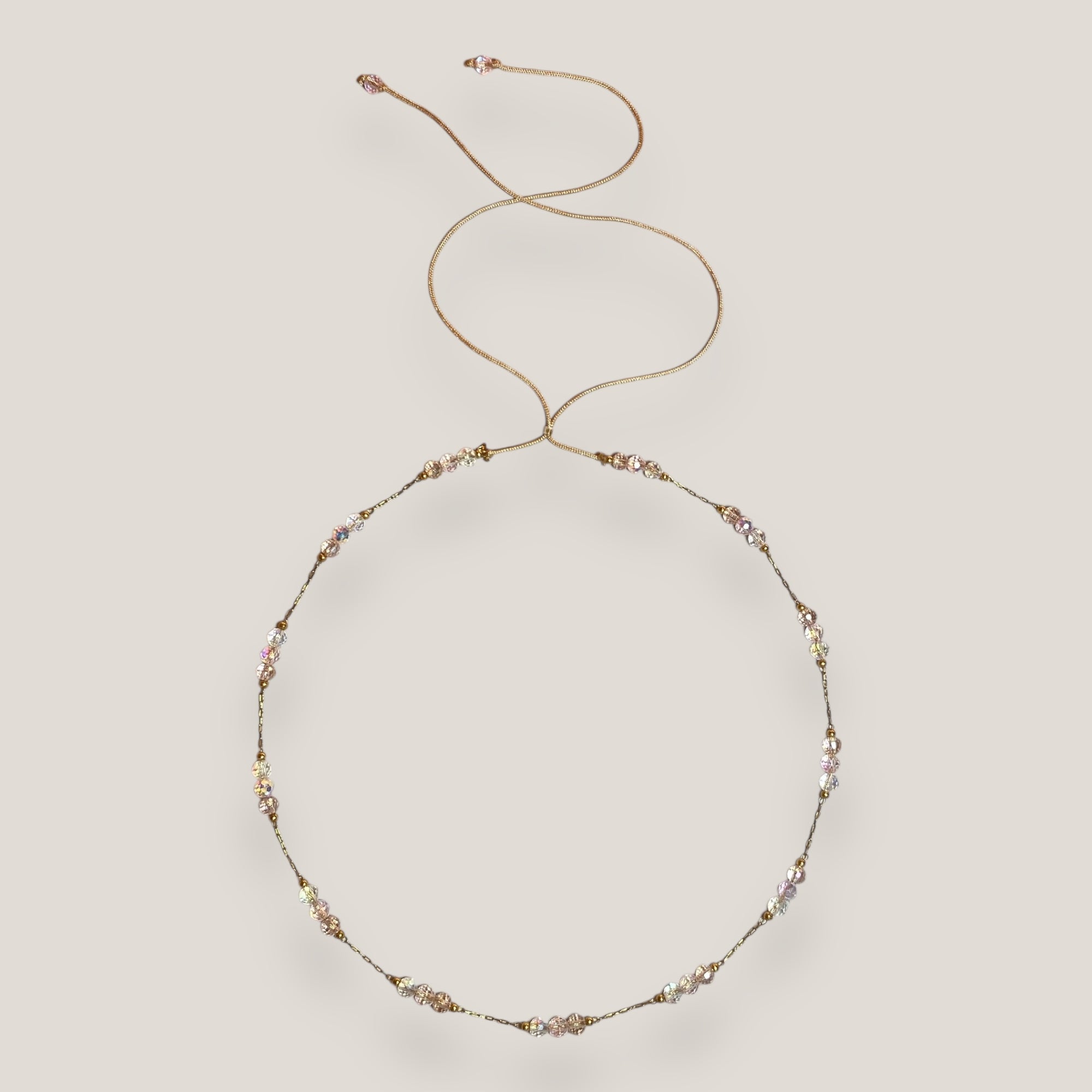 Collar Bella de cristal facetado tornasol rosado, engarce con cadena acero oro