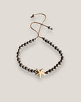 Pulsera Eloise con estrella howlita blanca, lava y hematitas facetadas gris metalizadas