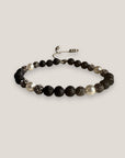 Pulsera Dafne perlas con lava negra y filigrana gunmetal con cristalitos