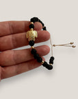 Bracelet with large golden turtle and colored lava