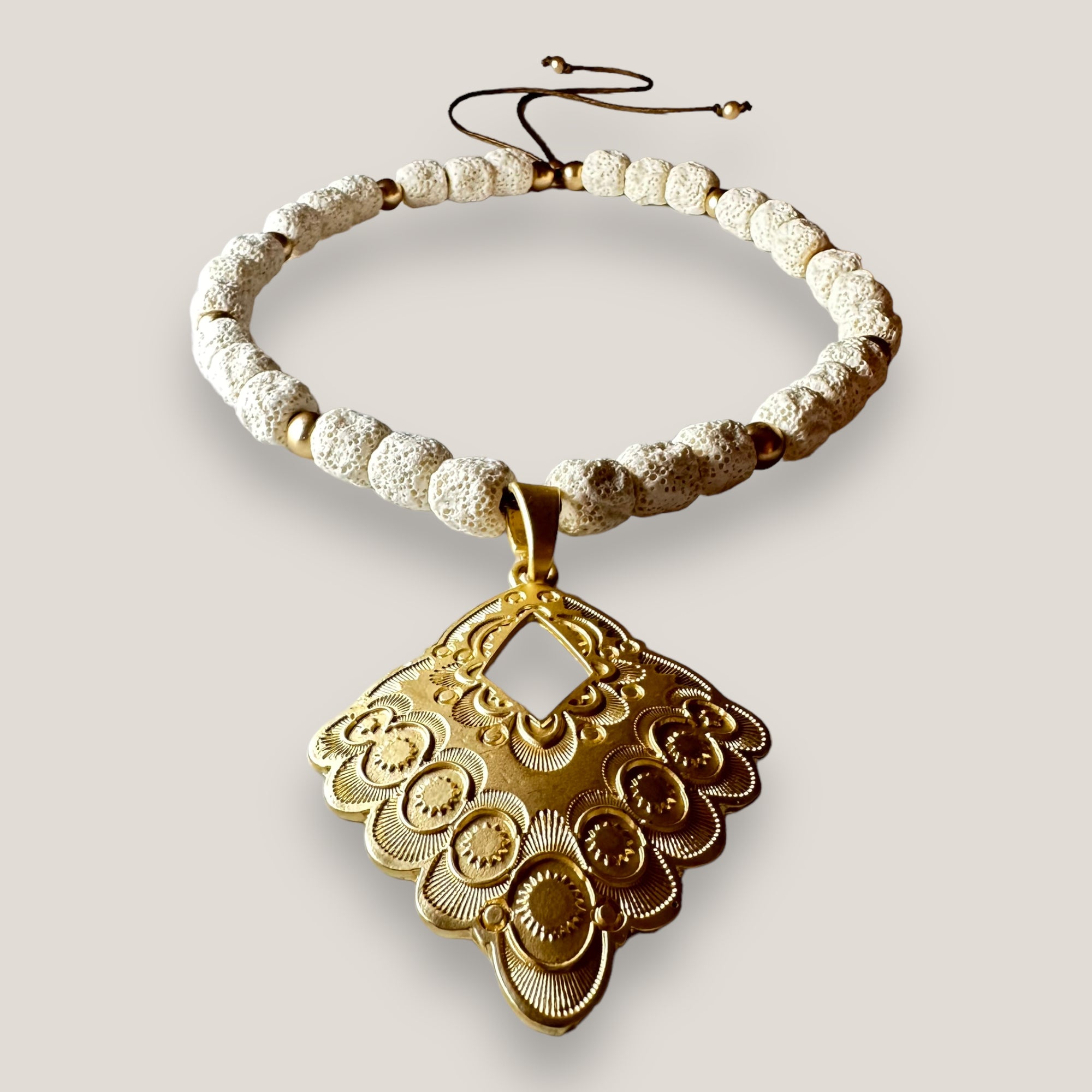 Maxi bracelet with golden turtle and colored lava