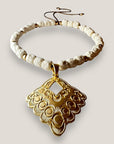 Maxi bracelet with golden turtle and colored lava