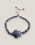 Pulsera tortuga cerámica azul claro ágatas facetadas azul claro y blanco
