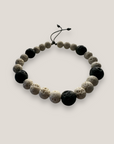 Pulsera Aventura con esponja coral beis y lava negra