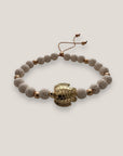 Bracelet with large golden turtle and colored lava